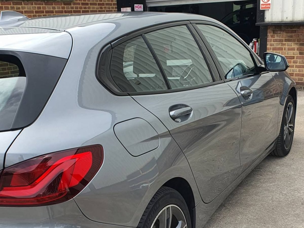 BMW 1 Series after rear quarter panel repair and paint refinishing at VRS Bodyshop