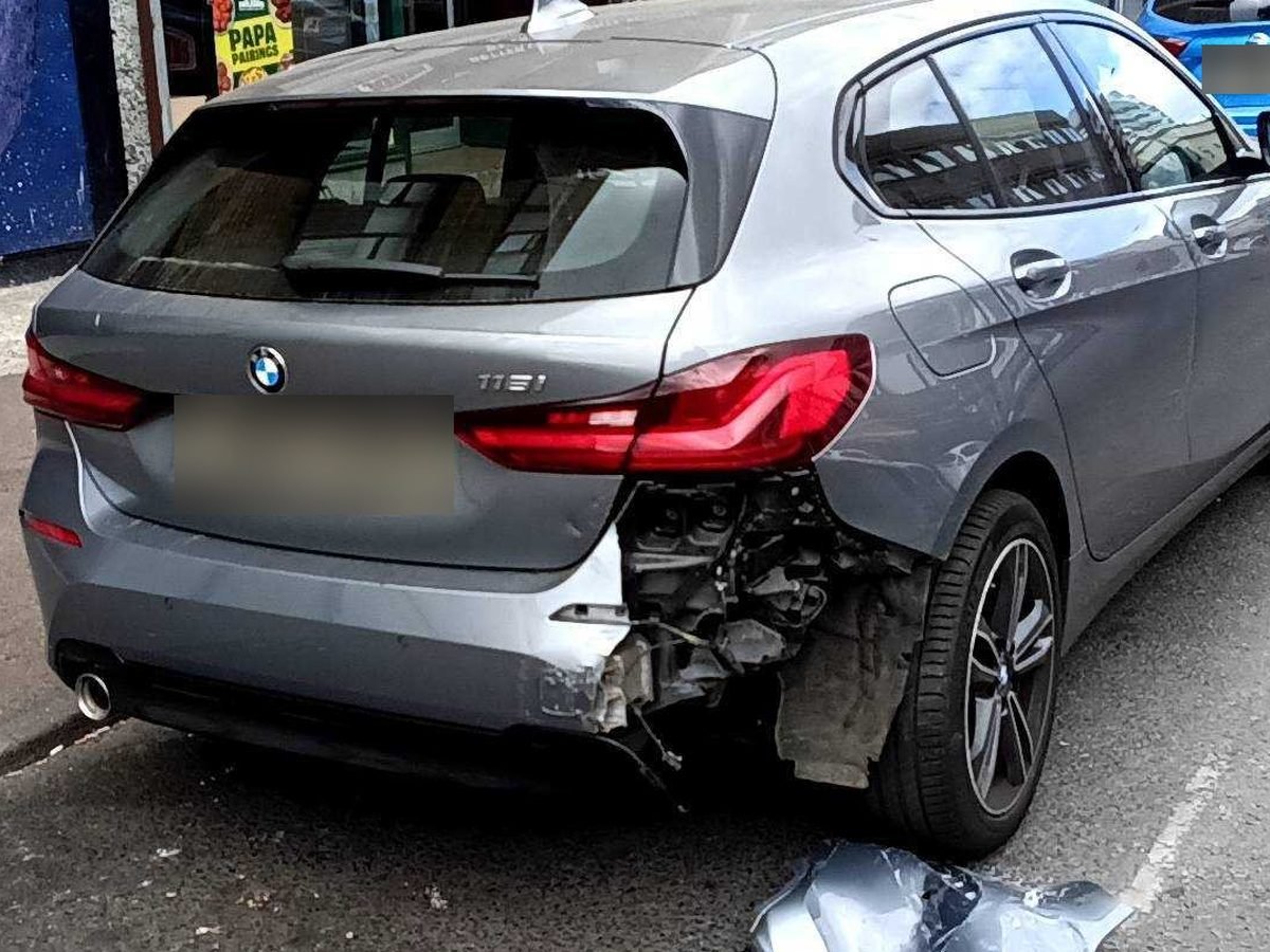 BMW 1 Series with rear quarter and bumper accident damage before repair